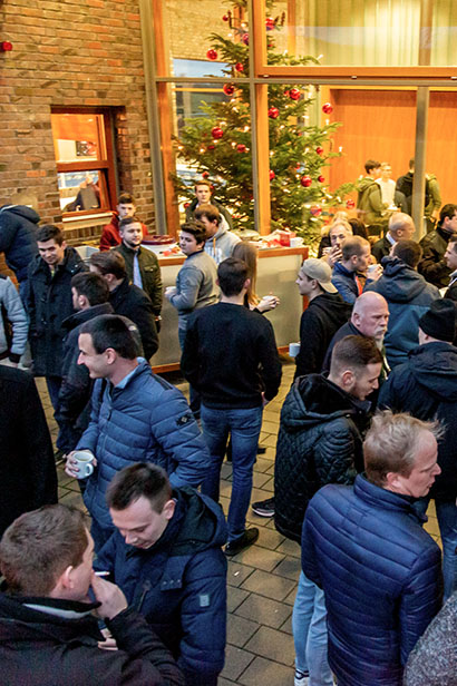 Employees at a ZELTWANGER Christmas party